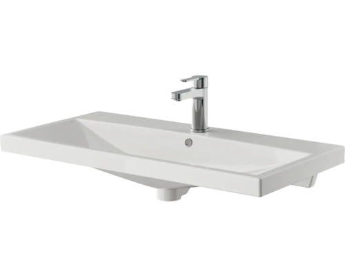 Lavabo en céramique avec robinet