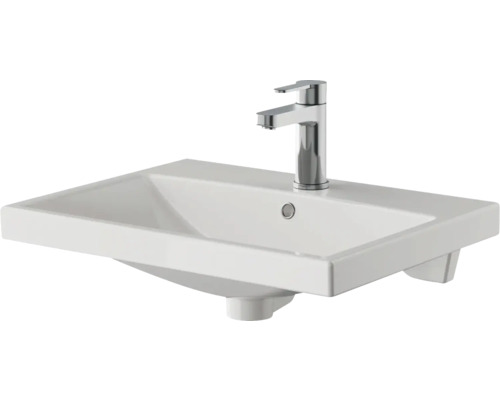 Lavabo en céramique avec robinet