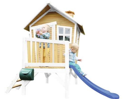Maisonnette pour enfants avec toboggan et boîte aux lettres dans le jardin