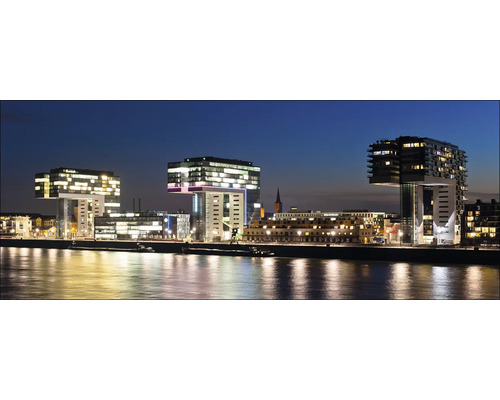 Vue panoramique nocturne de Cologne avec vue sur le Rhin et les bâtiments illuminés
