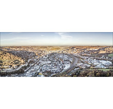 Vue panoramique d''une ville avec beaucoup d''espaces verts et de zones résidentielles.