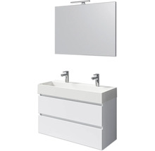 Weißer Waschtisch mit zwei Schubladen, Aufsatzwaschbecken mit zwei Wasserhähnen und rechteckiger Spiegel mit Lampe