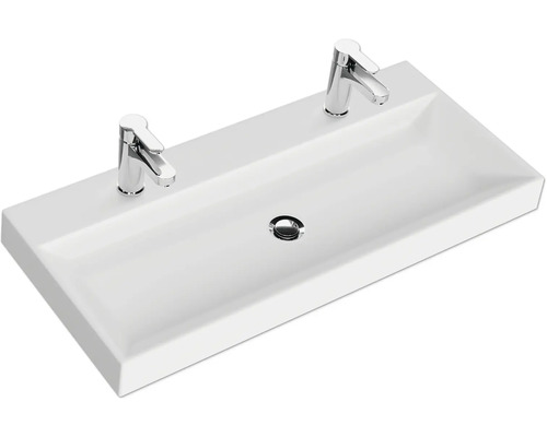 Rechteckiges Waschbecken aus Sanitärkeramik mit zwei Armaturen
