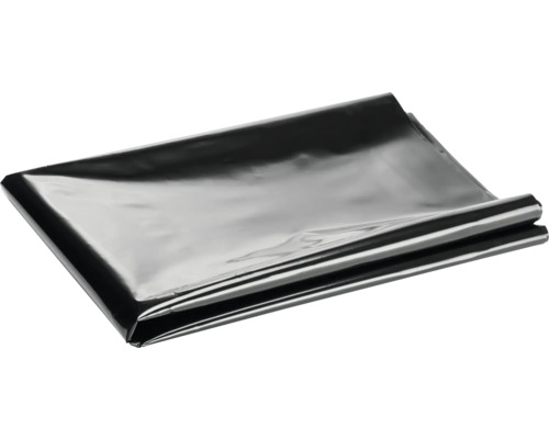 Feuille de construction noire, présentée pliée.