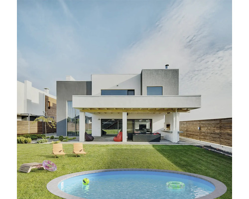 Jardin avec maison moderne, piscine et mobilier de jardin
