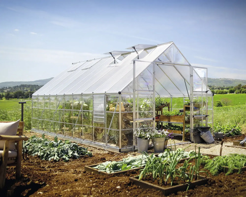 Gewächshaus Palram – Canopia Balance Polycarbonat 0,7 mm 304 x 604 cm silber Gewächshaus mit Pflanzen und Garten im Freien