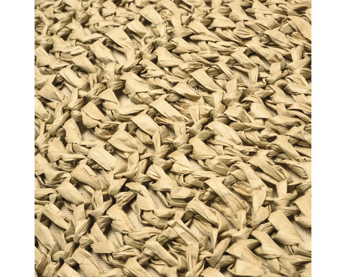 Gros plan d''un coussin avec une surface tressée