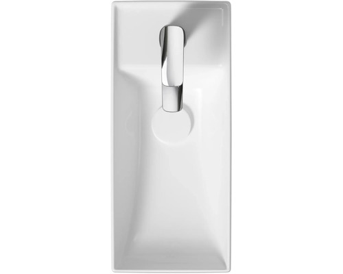 Vue de dessus d''un lavabo à poser blanc avec robinet