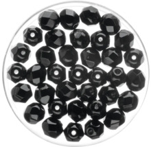Schwarze Rocailles in einer transparenten Dose