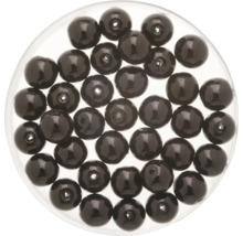 Schwarze Füllkugeln in durchsichtiger Verpackung