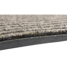 Vue détaillée d''un paillasson avec structure rainurée et dessous en mousse