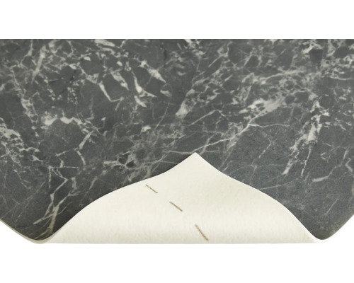 Gros plan d''un carreau de sol en vinyle à motif marbré.