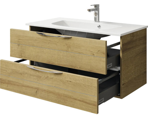 Meuble sous-lavabo avec deux tiroirs ouverts et vasque à poser