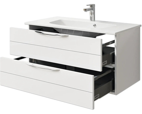 Meuble sous-lavabo avec deux tiroirs ouverts et lavabo en céramique