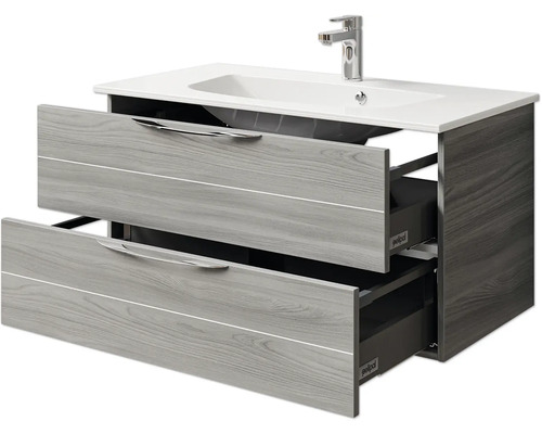 Meuble sous-lavabo avec deux tiroirs ouverts et vasque à poser