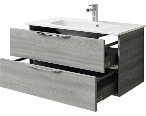 Meuble sous-lavabo avec deux tiroirs et élément coulissant ouvert
