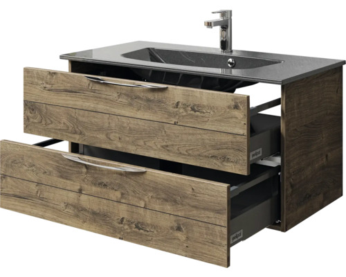 Meuble sous-lavabo avec deux tiroirs ouverts, aspect bois et un lavabo avec robinet