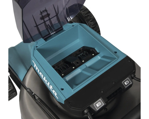 Vue détaillée du compartiment à piles d''une tondeuse à gazon avec couvercle ouvert