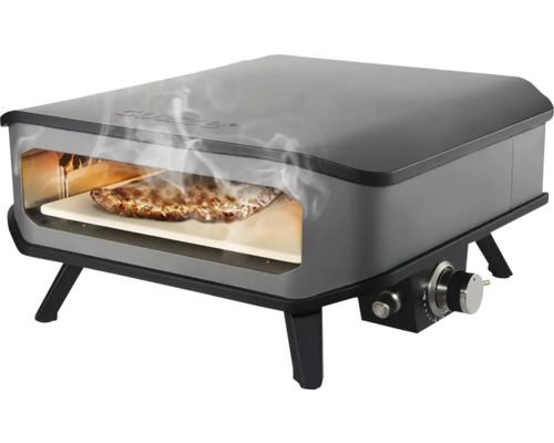 Four à pizza à gaz avec pizza sur une pierre à pizza