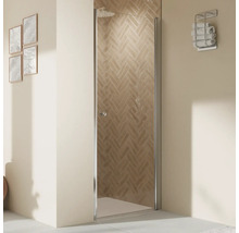 Cabine de douche avec porte en verre dans une salle de bains