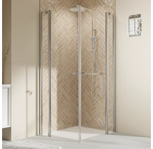 Cabine de douche d''angle avec robinetterie de douche et porte-serviettes dans la salle de bain