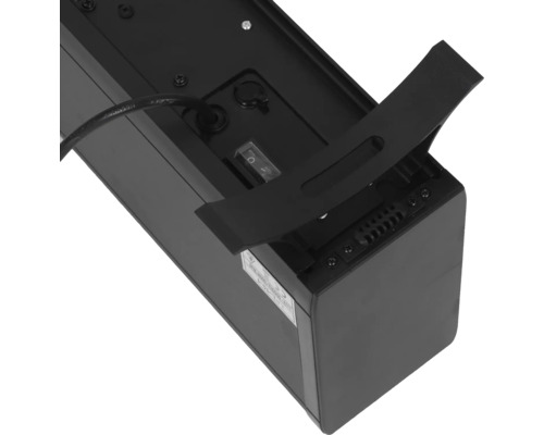 Arrière d''un appareil électronique noir avec câble, interrupteur et support