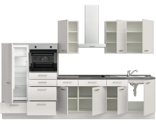 Cuisine équipée avec réfrigérateur, four, hotte aspirante, évier et placards