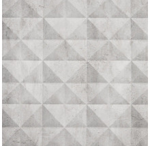 Carreau de béton avec motif géométrique de pyramides