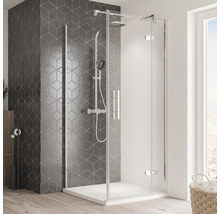 Cabine de douche d''angle avec parois en verre transparent et robinetterie apparente dans la salle de bain