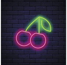 Lampe néon motif cerise devant un mur de briques