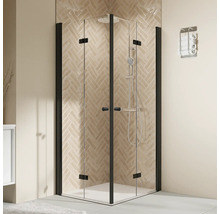 Cabine de douche d''angle avec cadre noir et ensemble de douche dans une salle de bain