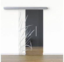 Porte en verre avec motif d''herbes et système de porte coulissante devant un mur