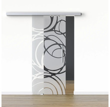 Porte coulissante en verre avec motif devant un mur