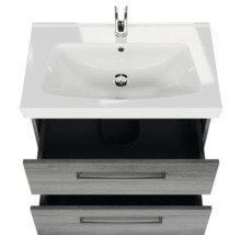 Meuble-lavabo avec deux tiroirs ouverts et lavabo à poser