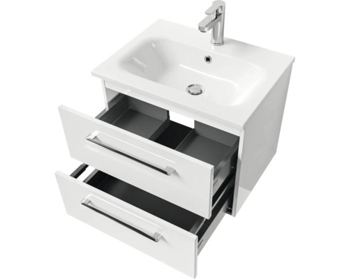 Meuble-lavabo avec deux tiroirs ouverts et robinet