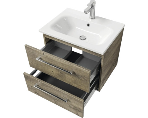 Meuble sous-lavabo avec deux tiroirs ouverts, lavabo et robinet