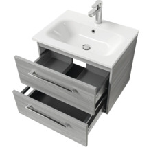 Meuble sous-lavabo avec deux tiroirs ouverts et lavabo à poser