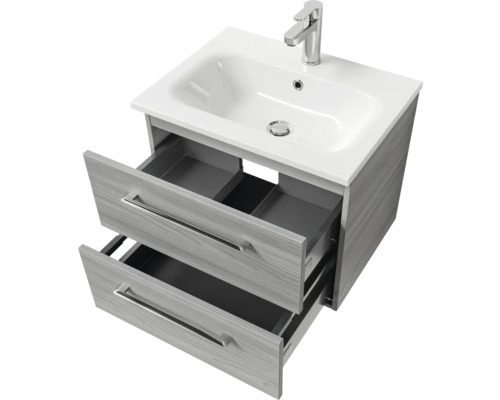 Meuble sous-lavabo avec deux tiroirs ouverts et lavabo à poser