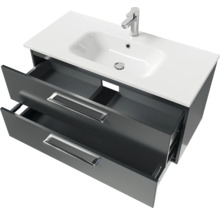 Meuble sous-lavabo avec deux tiroirs ouverts et lavabo à poser