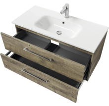 Meuble sous-vasque avec deux tiroirs ouverts et vasque à poser