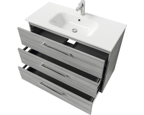 Meuble sous-lavabo avec trois tiroirs, lavabo et robinet