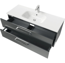 Meuble sous-lavabo avec deux tiroirs ouverts, lavabo et robinet