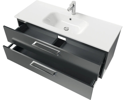 Meuble sous-lavabo avec deux tiroirs ouverts, lavabo et robinet