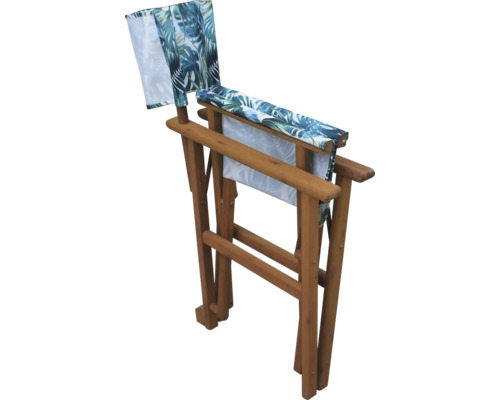 Zusammengeklappter Regiestuhl mit tropischem Muster