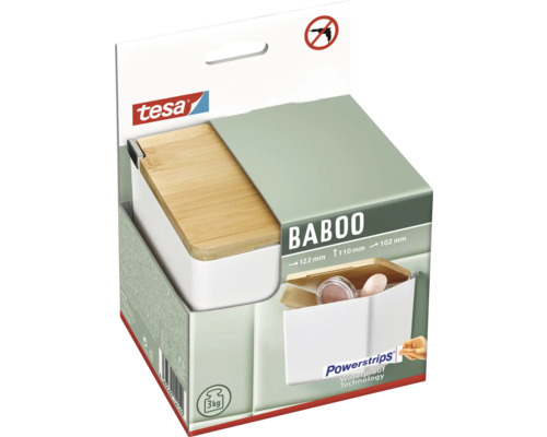 Boîte de rangement Tesa Baboo dans une boîte en carton avec la technologie Powerstrips Waterproof et un symbole interdisant l''utilisation d''une perceuse