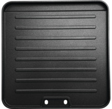 Plaque de grill noire avec surface rainurée