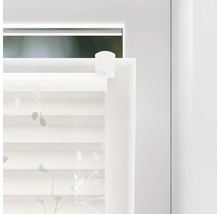 Vue détaillée d''un store de fenêtre blanc avec motif floral