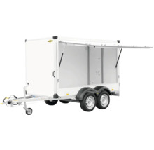 Weißer Anhänger mit geöffneter Seitenklappe