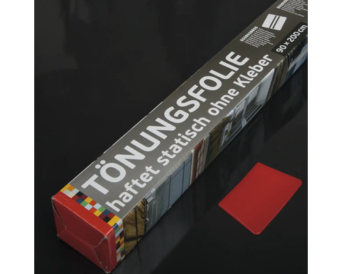 Verpackung einer statisch haftenden Tönungsfolie 90 x 200 cm und ein rotes Werkzeug