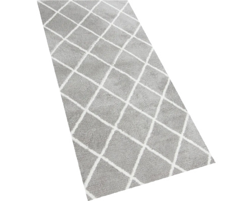 Tapis gris avec motif losanges